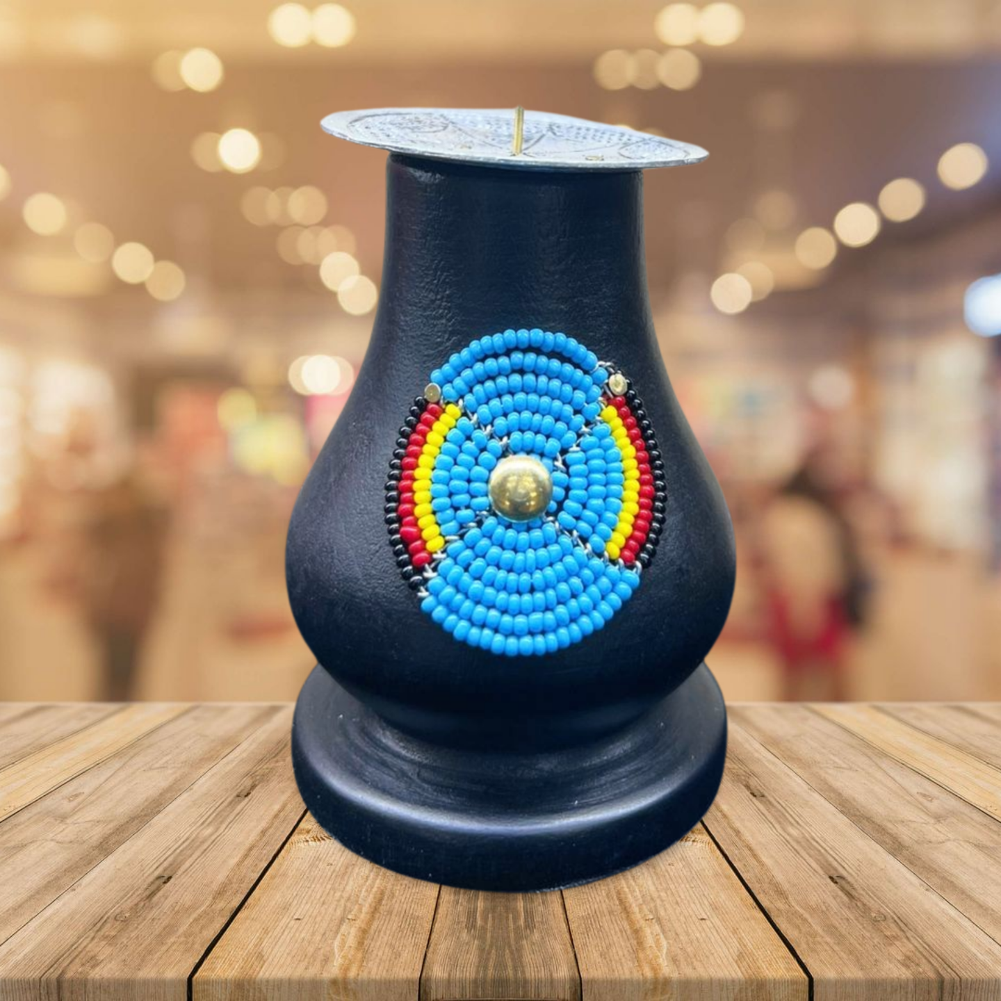 African-themed wooden candle stand